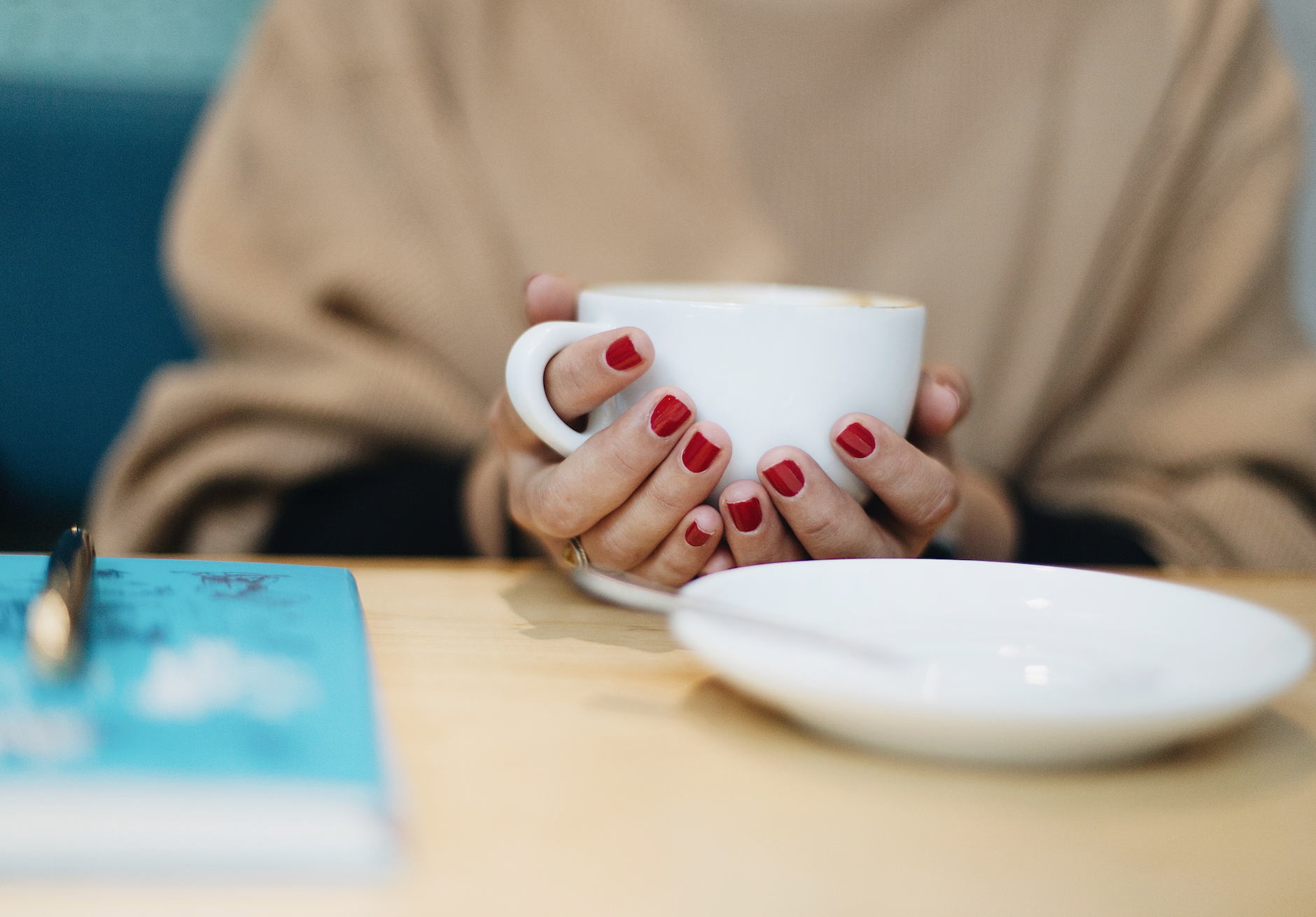 Sylwia holding coffee mug