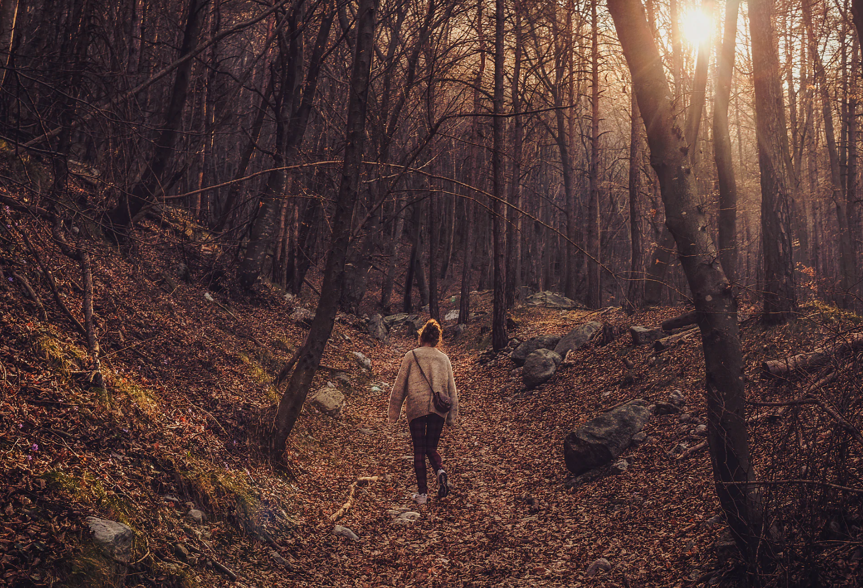 woman walking in woods